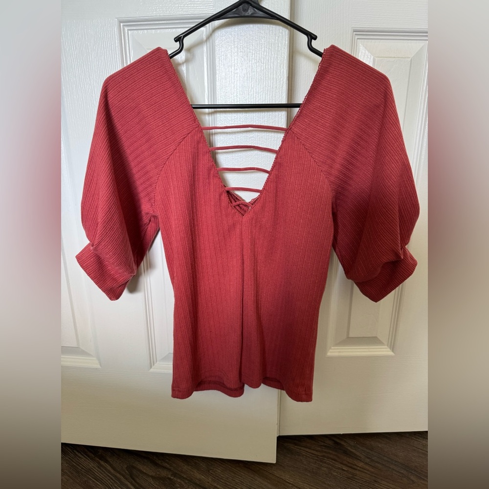 The Buckle V-Neck Blouse with Strappy Back